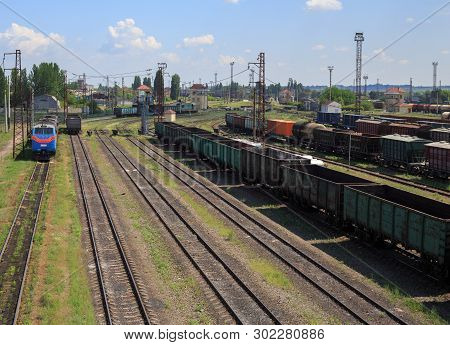 Freight Trains On City Cargo Terminal. Railways In Train Parking. Arain Arrived At The Station. Carg