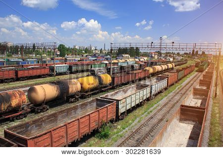 Freight Trains On City Cargo Terminal. Railways In Train Parking. Arain Arrived At The Station. Carg