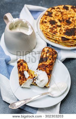 Homemade Potato Pancakes Lefse With Sour Cream.