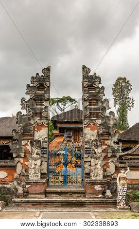 Bali, Indonesia - February 25, 2019: Ulun Danu Beratan Temple Complex In Bedoegoel. Split Gate To Re