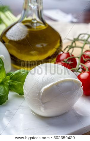 Balls Of Buffalo Mozzarella, Soft Italian Scheese Made From The Milk Of Italian Mediterranean Buffal