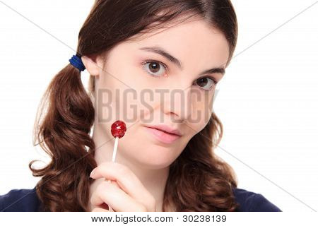 สาวผู้ใหญ่ใน Pigtails กับขนมอมยิ้ม