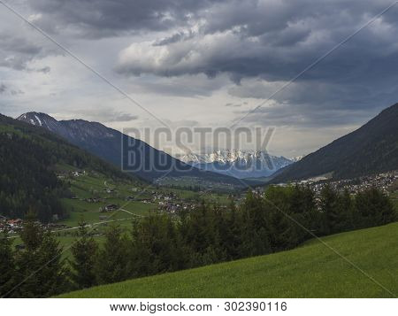 Spring Mountain Rural Landscape. View Over Stubaital Stubai Valley Near Innsbruck, Austria With Vill
