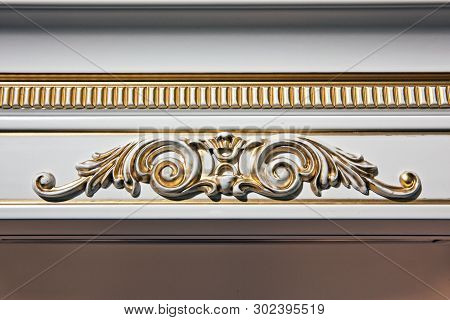 Luxury Interior. Stucco Elements On Light Wall. White Patterned. Mouldings Element From Gypsum. Rocc