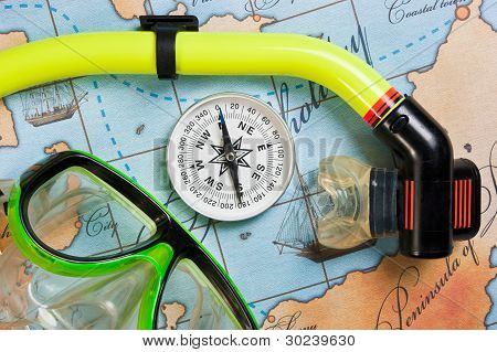 Swimming Accessories And Items For Leisure Travel On  Background Map