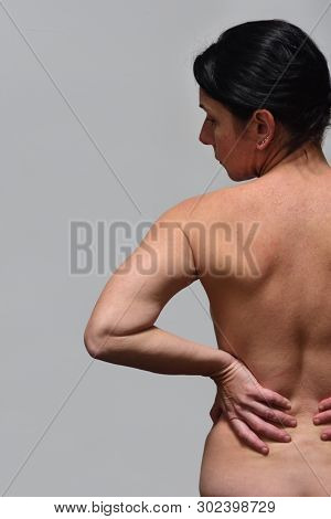 Middle Aget Woman With Low Back Pain
