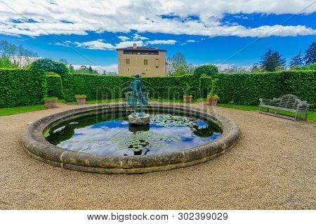 Saint-bernard, France - May 04, 2019: View Of The Chateau (castle) And Its Gardens In Saint-bernard,