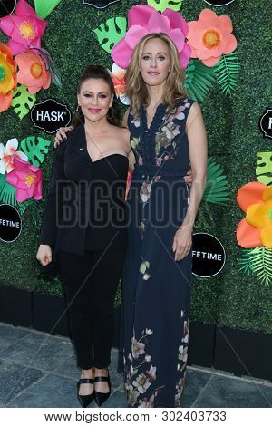 LOS ANGELES - MAY 20:  Jordan Whalen, Kim Raver at the Lifetime TV Summer Luau at the W Hotel on May 20, 2019 in Westwood, CA