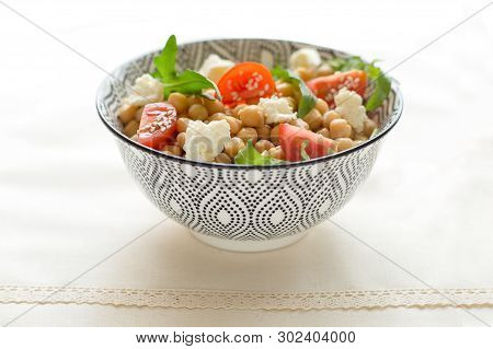 Fresh Organic Salad With Chickpeas, Arugula, Tomatoes, Rustick Table, Close Up