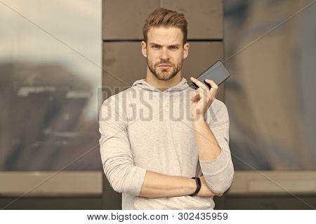 Set Up Route For Jog. Sportsman With Smartphone And Pedometer Prepare For Jog. How Set Up Route For 