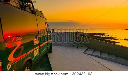 Camper Car On Rest Stop Location. Andoya Island Seascape At Midnight Sun During Summer, View From Bu