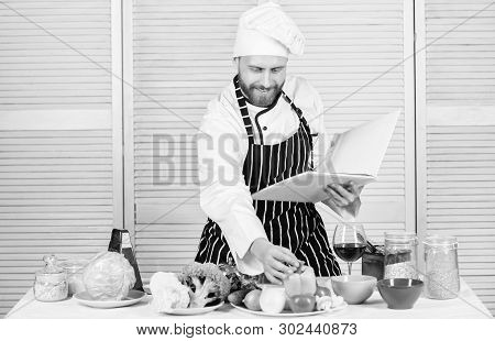 Book Family Recipes. Ultimate Cooking Guide For Beginners. According To Recipe. Man Bearded Chef Coo
