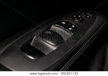 Novosibirsk, Russia - May 20, 2019:  Nissan Pathfinder,close-up Of The Side Door Buttons: Window Adj