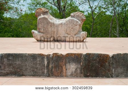 Ancient Mayan Statue, Which Symbolizes A Jaguar With Two Heads, In The Archaeological Area Of Uxmal,