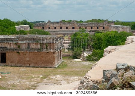 Mayan Ruins, With Temples And Dwellings, In The Archaeological Area Of Uxmal, In The Mexican Yucatan