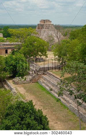 Mayan Ruins Of The Archaeological Area Of Uxmal, In The Mexican Peninsula Of Yucatan, With The Great