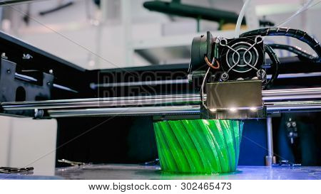 Print Head Of 3d Printer Machine Printing Plastic Model At Modern Scifi Technology Exhibition. 3d Pr