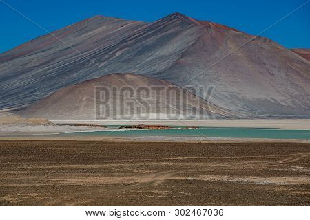 Unreal Red Stones And Talar Salar In Atacama