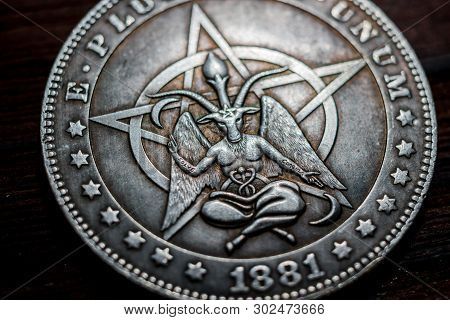 Russia - March 2019: Souvenir Coin With The Image Of A Baphomet Close-up. Inscription Solve Coagula 