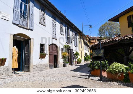 Characteristic Houses Of The Navigli District A Beautiful Pub Area Of Milan In The North Of Italy