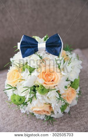 Men Accesory-butterfly  And Wedding Bouquet At Textile Background
