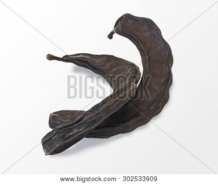 Close-up Dried Brown Carob Fruits Isolated On White Background. Food And Drinks Ingredient.