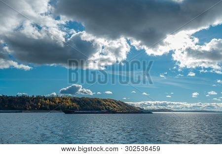 The Tow Pushes The Barge At The Volga River Near The Kozmodemiansk City, Mari El, Russia