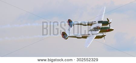 Pilsen / Czech Republic - September 9, 2018: Flying Bulls Red Bull sponsored Lockheed P-38 Lightning. Rare fighter plane over Pilsen.