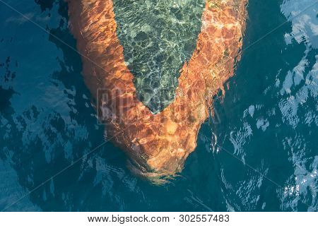 Bulbous Bow Of The Warship Sailing In The Deep Blue Sea Created Laminar Flow.