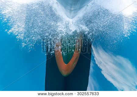 Bulbous Bow Of The Warship Sailing Through The Sea Created Wave Piercing Water Splash With Reflectio
