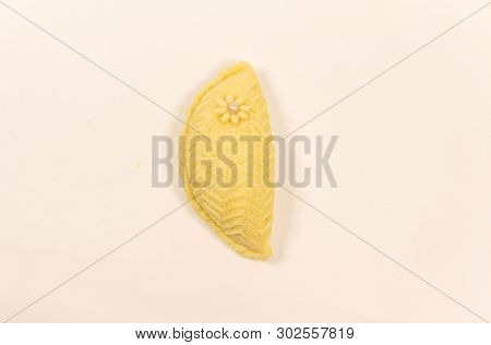 Isolated And Macro Shot Of Novruz Holiday Cookie Shekerbura On White Background