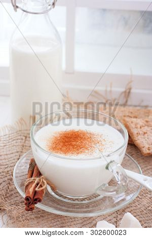 Homemade Kefir In A Glass Cup With Cinnamon And Sugar, Selective Focus