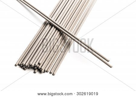 Electrodes For Welding Isolated On A White Background. Accessories Of Welder.