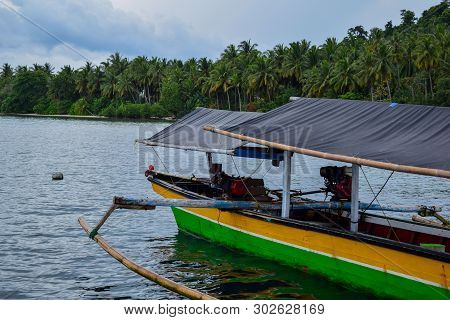 Traditional Fishing Wooden Boat Near Pahawang Island. Bandar Lampung. Indonesia. Traveling Concept. 
