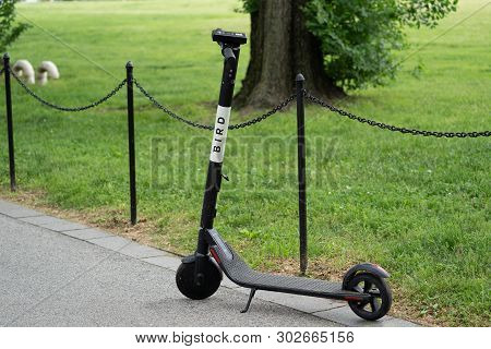 Washington, Dc - May 10, 2019:  A Dockless Bird Brand App-based Electric Rental Scooter,  Stands Upr