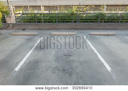 Empty Vacant Parking Lot/parking Garage Department Store With Copy Writing Space