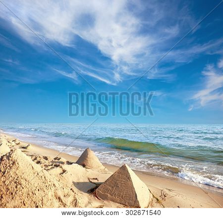 Sand Castles In Shape Of Pyramids On A Beach Of Baltic Sea In Northern Germany, Panoramic Image