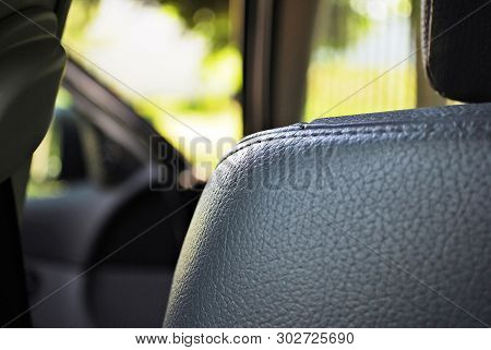 Cars leather interior detail. Car interior at day.