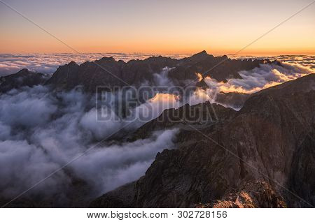 Mountains Landscape With Inversion In The Valley At Sunset As Seen From Rysy Peak In High Tatras, Sl