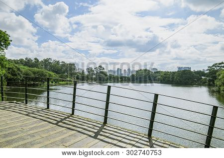 Sao Paulo Sp, Brazil - March 02, 2019: Arched Metal Bridge Above The Lake Of The Ibirapuera Park. Br