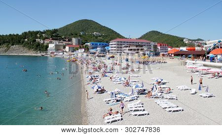 Olginka, Russia - May 24, 2019: Holidaymakers On The Beach, Olginka Village, Tuapse, The Black Sea, 