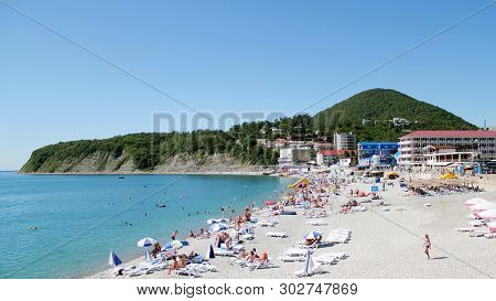 Olginka, Russia - May 24, 2019: Holidaymakers On The Beach, Olginka Village, Tuapse, The Black Sea, 