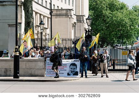 London, Uk - May 15, 2019:  Kurdish Demonstrators In Front Of Downing Street Gate Against British Su