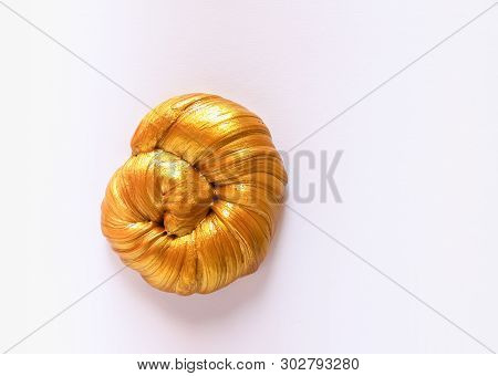 Golden Plasticine Soft Stretchable Texture. Anti-stress Toy For Kids Activities, Handmade, Fun.