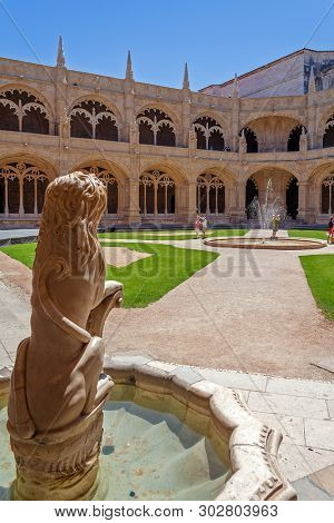 Lisbon, Portugal - June 30, 2018: Lion fountain. Cloister of Jeronimos Monastery or Abbey aka Santa Maria de Belem. UNESCO World Heritage. Manuelino or Manueline