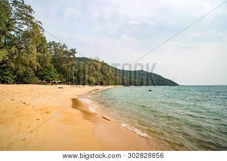 Lazy Beach On The Koh Rong Samloem Tropical Island At Sunny Summer Day With Beautiful Blue Sky. Camb