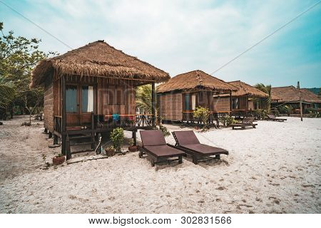 Huts For Living On White Sand On The Beach On The Island Koh Rong Samloem, Saracen Bay. Cambodia.