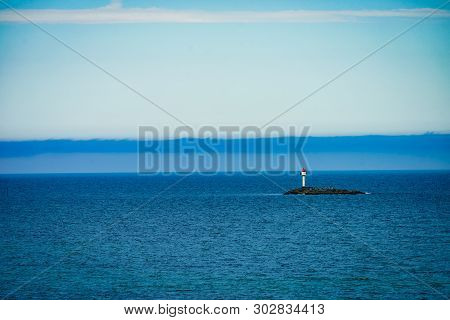 Seascape Sandy Beach Sea Shore With Lighthouse On Horizon. Andoya Island Bleiksstranda Beach. Vester