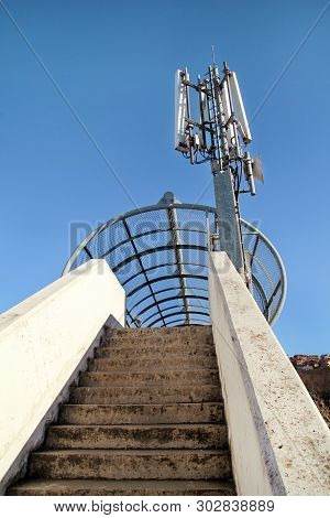 Telecommunication Base Stations Network Repeaters. The Cellular Communication Aerial On A Building. 