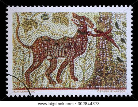 ZAGREB, CROATIA - JULY 03, 2014: A stamp issued in Yugoslavia shows Cerberus, mosaic series, circa 1970.